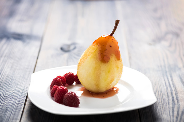 homemade dessert - pear with raspberries - Photo, Image
