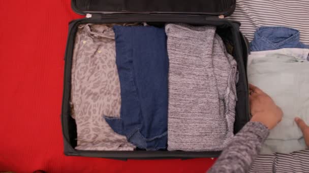 woman packing luggage  - Felvétel, videó