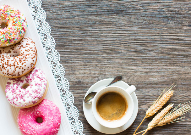 Morning breakfast with colorful Donuts and coffee - Foto, imagen