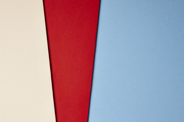 Colored cardboards background beige red blue tone. Copy space - Foto, Bild