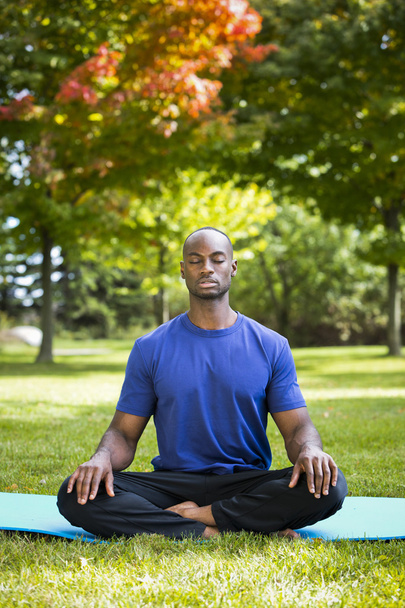 young man exercising yoga - Φωτογραφία, εικόνα