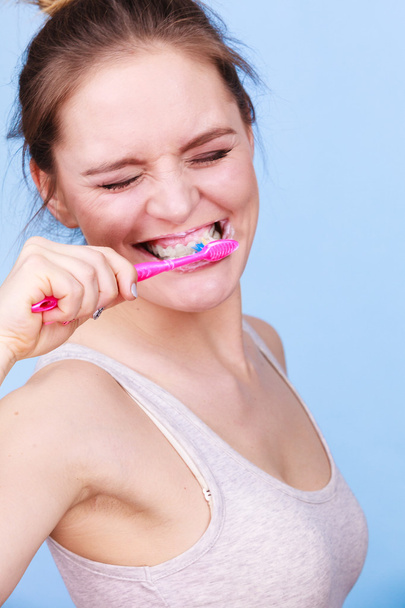 Woman brushing cleaning teeth - Photo, Image