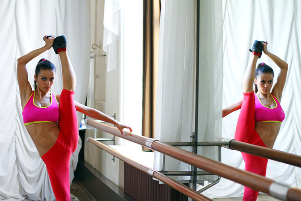 Young caucasian woman dancer in pink clothes - Fotografie, Obrázek