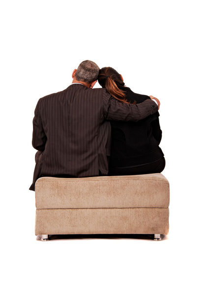 Vista trasera de una pareja sentada
 - Foto, Imagen