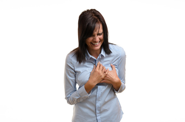 Giovane donna che soffre di angina o un attacco di cuore
 - Foto, immagini