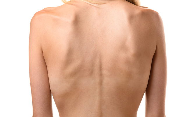 Visão traseira das costas de uma mulher magra
 - Foto, Imagem