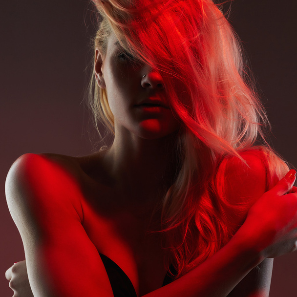 sexy beautiful young woman.fashion art nude girl in red light - Photo, Image