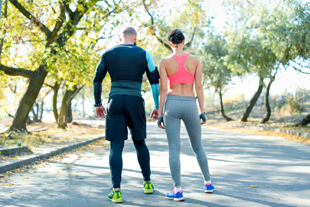 Couple standing before the morning run  - Photo, Image
