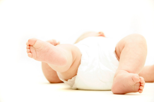 baba láb felett fehér - Fotó, kép