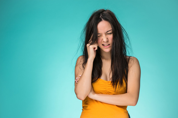 Frustrated young woman having a bad hair - Foto, imagen