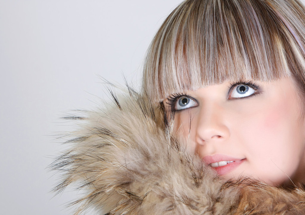 studio shot of beautiful girl in fur - Фото, изображение