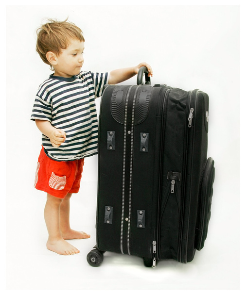 Young tourist with heavy suitcase - Foto, Bild