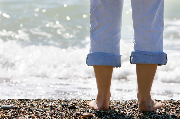 female feet on sea background - Photo, Image
