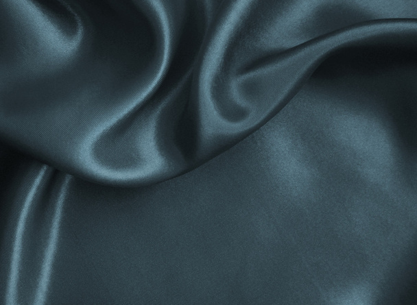 Smooth elegant grey silk or satin texture as background   - 写真・画像