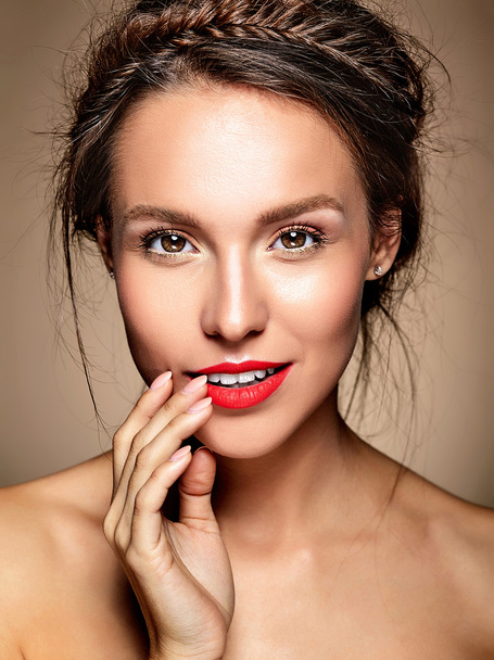 portrait of beautiful woman model with fresh daily makeup and red lips and healthy skin - Foto, immagini
