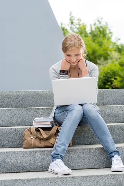 Young student woman outdoor with laptop - Φωτογραφία, εικόνα