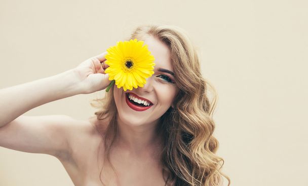 Girl with flower - Фото, изображение
