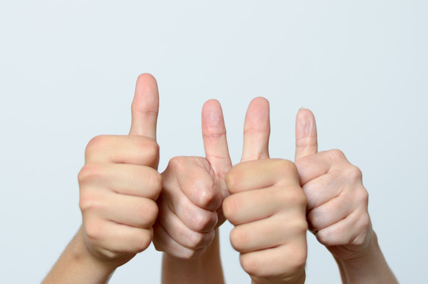 Two people giving a thumbs up gesture - Photo, Image