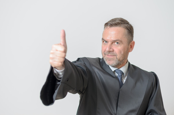 Businessman giving a thumbs up gesture - Photo, Image