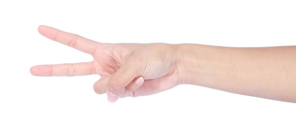 hand met twee vingers omhoog in de vrede - Foto, afbeelding