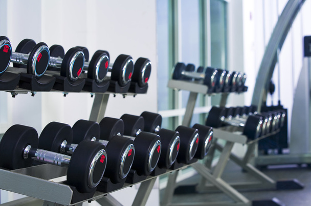 Fragment like view of gym interior with some dumbbells - Photo, Image