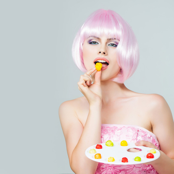 pretty girl in pink wig with marmalade palette - Photo, image
