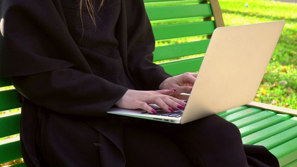 woman working with laptop outdoors - Photo, Image