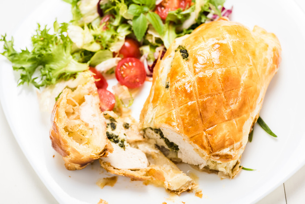 chicken breast stuffed spinach in puff pastry - Фото, изображение
