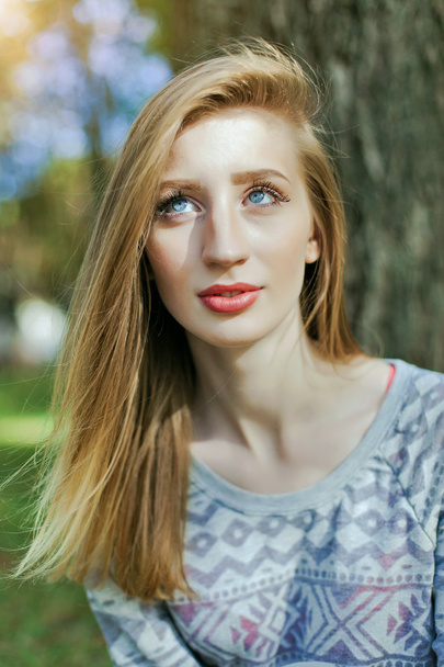 Portrait of a young girl with blue eyes - Zdjęcie, obraz