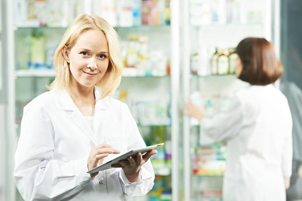 Happy Pharmacy chemist woman in drugstore - Φωτογραφία, εικόνα