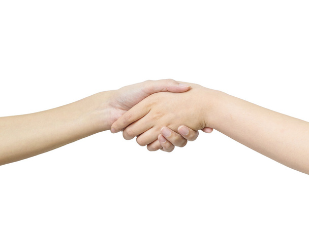 Gros plan main de femme asiatique serrer la main avec quelqu'un isolé sur fond blanc avec chemin de coupe
 - Photo, image