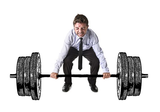 corporate composite of young attractive businessman power lifting heavy dumbbell weights - Zdjęcie, obraz