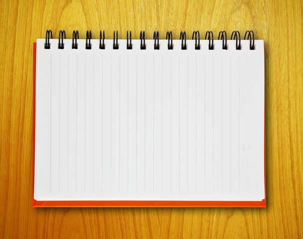 Cuaderno naranja abierto
 - Foto, imagen