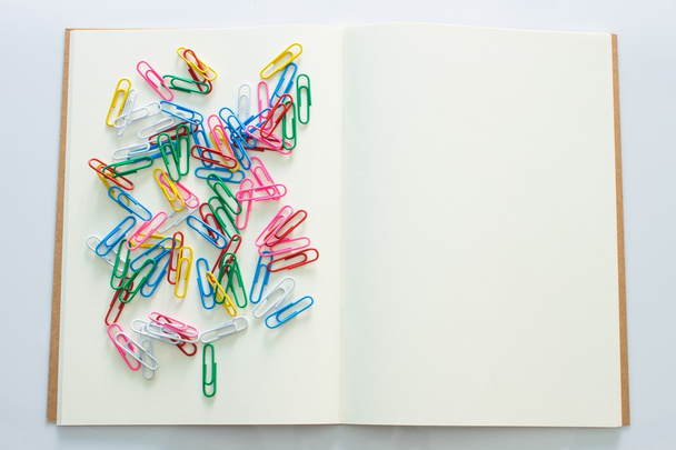 colorful paper clips on white background - Photo, image