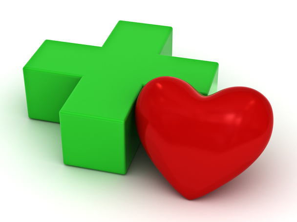 Green plus and red heart shape on white - Photo, Image