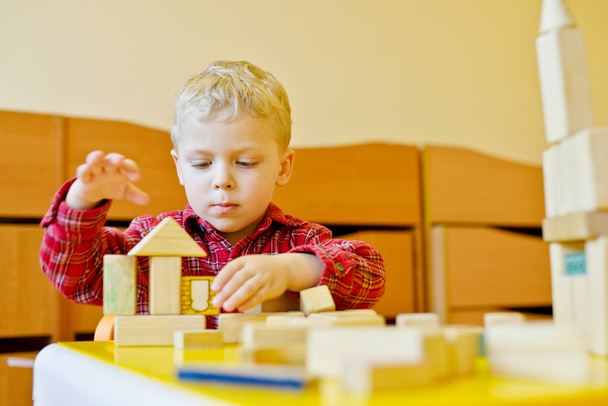 toddler boy playing blocks - Foto, imagen