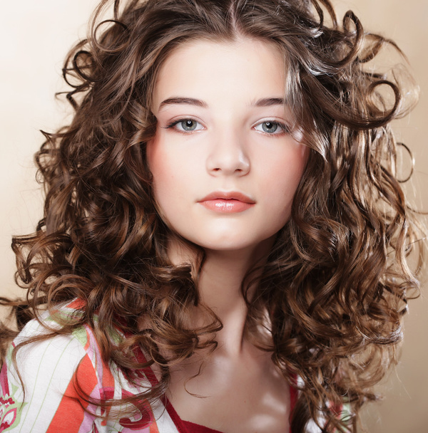 Image of beautiful young woman with curly hair - Photo, Image