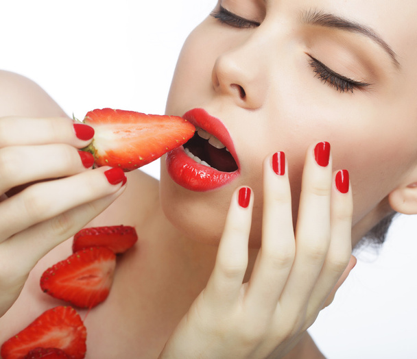 woman with strawberry on the white background - Fotó, kép