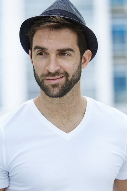 Handsome young man in hat  - Foto, afbeelding