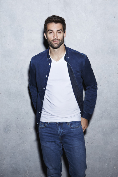 Handsome man in shirt and jeans - Fotó, kép
