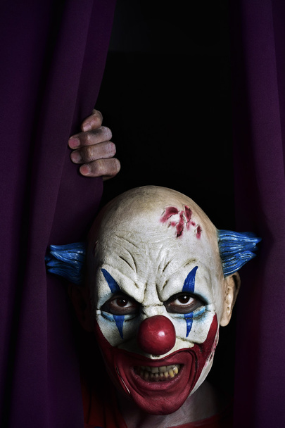hrůzostrašný zlý klaun ve fázi - Fotografie, Obrázek