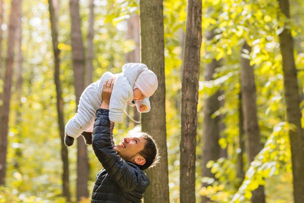 Little baby and father having fun outdoors - Photo, Image