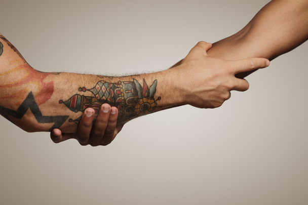 handshake of two young men - Foto, Imagem