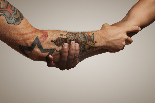 Forearm shake of two young male friends - Foto, immagini