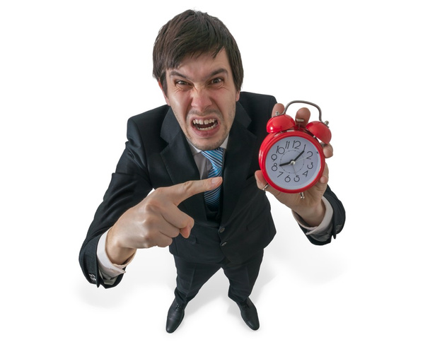Angry boss is yelling and pointing on clock. Deadline concept. - Photo, Image