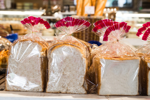 Organic gluten free bread in plastic wrapper - Photo, Image
