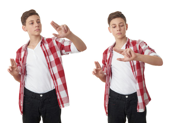 Cute teenager boy over white isolated background - 写真・画像