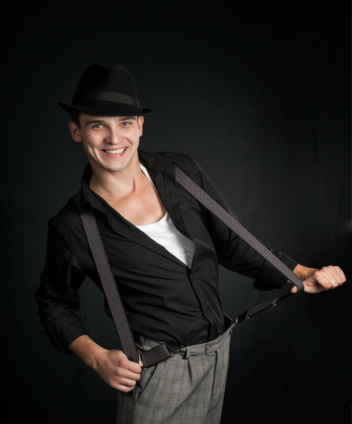 Stylish young man wearing a hat - Photo, image