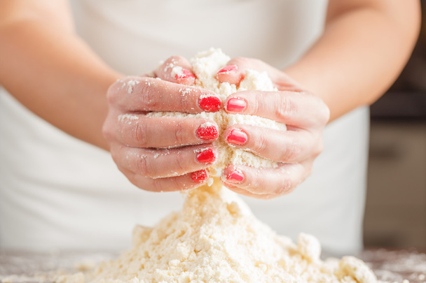 hands kneading bread dough - 写真・画像