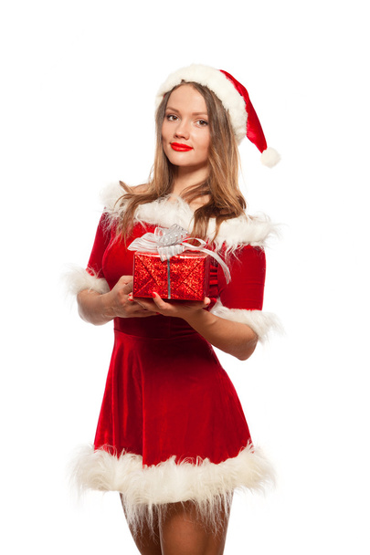 christmas, x-mas, winter, happiness concept - smiling woman in santa helper hat with gift box, isolated on White Background. - Φωτογραφία, εικόνα